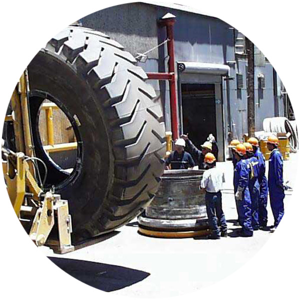 57" tyre assembling training. Quajone. Peru